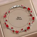 Silbernes Blattarmband mit roten Zirkoniasteinen und Klappverschluss, Länge 20 cm - Roter Edelstein Silberblatt Stil (DQ-W-2669)