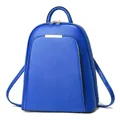Front detail of royal blue large capacity backpack with golden metallic decorative bar - One Size / Blue