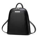 Minimalist black PU leather backpack for women with silver metal bar detail and dual zippers - One Size / Black