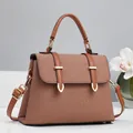 Brown textured fabric handbag with leather straps and gold hardware for women - Khaki/Earth Yellow