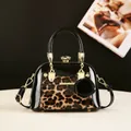 Elegant leopard print leopard shell bag with patent leather trim and golden hardware - Leopard Pale Red