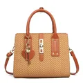 Retro brown herringbone crossbody bag with leather trim and heart charm on white background - Earthy Yellow