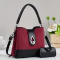Chic burgundy and black patchwork handbag with silver hardware and mini cylindrical pouch - Red