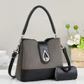 Chic two-piece grey suede and black leather tote bag with round handles and strap - Gray