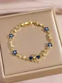 Eleganteres vergoldetes Blattarmband mit blauen Blumen und Schmetterlings-Zirkonia - Blaue Blume Goldrebe Stil (DQ-W3391)