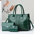 Three-piece dark green crocodile pattern patent leather tote bag with matching wallets - Green