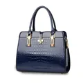 Navy blue crocodile embossed patent leather tote bag with elegant gold hardware accents - Sapphire Blue