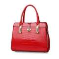 Red crocodile embossed patent leather tote bag with elegant gold metallic hardware - Red
