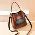 Sac seau rétro bicolore marron avec poignée et bandoulière réglable pratique - Marron