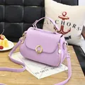 Chic lilac purple PU leather handbag with lychee texture and gold metal buckle detail - Round Lock Style / Purple