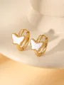 Detailed shot of golden butterfly earrings with white mother-of-pearl and beaded edges - White