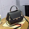 Chic black litchi pattern PU leather handbag with golden heart-shaped twist lock - Heart Style / Black