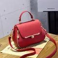 Chic red litchi pattern PU leather handbag with gold hardware and removable crossbody strap - Heart Style / Red