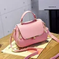 Pink lychee textured faux leather handbag with floral clasp and gold-tone hardware - Heart Style / Dusty Pink