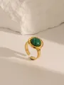 Macro detail of 18K gold plated ring with oval malachite stone and spiral texture - Style 1 Turquoise (W686)