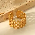 Detail of 18k gold plated open ring with geometric grid hollow pattern design - Wide Square Hollow Style