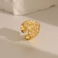 Detail of adjustable golden ring with textured heart shape and rustic lava surface finish - Heart-Shaped Lava Texture (W683 Style 1)