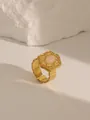 Detailed close-up of a floral 18K gold plated ring with a pink oval gemstone - Style 1 Rose Quartz (W691)