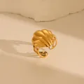 Close-up of golden textured dome ring with radial pattern and side hollow details - Domed Radial Texture (W685 Style 1)