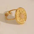 Macro detail of 18k gold plated sunburst ring featuring a pink turquoise oval gemstone - Adjustable Open / Hammered Sunburst Oval Style (W714) / Rose Quartz Color