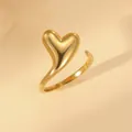 Detailed close-up of 18k gold plated stainless steel open ring with a 3D heart design - Heart Streamline Gold Plated Style