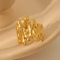 Macro shot of gold textured ring with lava surface on beige ceramic background - Irregular Lava Bark Texture (W1095 Style 3)