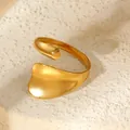 Detailed view of the fluid curved design of this gold plated stainless steel ring. - Streamlined Irregular Curved Style