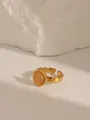 Detail of peach stone ring with heart-shaped gold band on white textured rock - Style 4 Rose Quartz (W723)