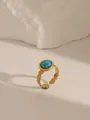 Detailed macro view of an adjustable gold heart-shaped ring with a turquoise stone inlay - Style 2 Turquoise Blue (W723)
