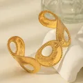 Macro detail of gold hammered texture cuff bracelet with hollowed rings and beaded edges - Hollow Ring Hammered Style (W1831-3)