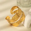 Detailed view of wide gold hammered cuff bracelet with irregular wavy edges and multi-layer texture - Multi-layer Hammered Wave Style (W1831-2)