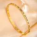 Detail of gold-plated bangle featuring roman numeral engravings and inlaid crystals - Roman Numerals Zirconia Style / Gold