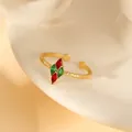 Detail of adjustable gold ring with hammered texture and marquise-cut red green stones - Red Green Marquise Gemstone Hammered Ring (W1494-1)