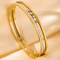 Luxury gold bangle with three sliding stones and shimmering zircon inlay on silk - DQ-2445-2 (Sliding Diamond Style)