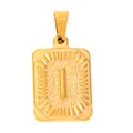 Macro detail of gold-plated rectangular pendant with embossed letter I and sunburst texture - Letter I