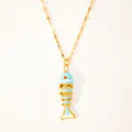 Close-up of a 18k gold-plated koi fish pendant with colorful enamel and a red gemstone eye - Blue and White Striped Fish (6-DQ-W-Fish)