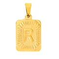 Macro detail of gold stainless steel rectangular pendant featuring embossed letter R - Letter R