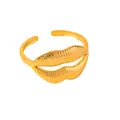 Macro detail of gold-plated stainless steel ring featuring a unique ribbed lip design - Striped Lip Design / Gold