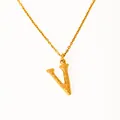 Macro shot of 18k gold plated V letter pendant with unique bark texture finish - Letter V