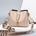 Beige faux leather handbag with golden tassel buckle and LOVE letter wide shoulder strap - Khaki