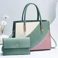 Dettaglio della borsa tote patchwork rosa e verde con pochette e dettagli in metallo - Verde