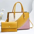 Dettaglio della borsa tote color-block con patchwork giallo, crema e rosa e cuciture a onda - Giallo