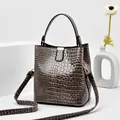 Gray-brown crocodile texture bucket bag with gold hardware and shoulder strap - Light Gray