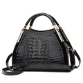 Classic black crocodile pattern handbag with gold hardware and detachable shoulder strap - Black