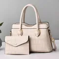 Chic cream white faux crocodile leather 2-piece tote and envelope bag set for women - Off-white