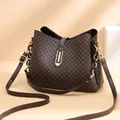 Deep brown bucket bag with vintage geometric patterns and dual shoulder straps - Coffee
