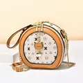 Sac bandoulière rond bicolore en similicuir avec motifs oursons et bandoulière chaîne - Imprimé Beige - Jaune