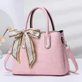 Pink faux leather handbag with crocodile pattern, silk scarf handle and shoulder strap - Pink