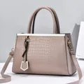 Taupe crocodile-embossed PU leather handbag with gold hardware and shoulder strap - Khaki