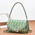 Sage green pleated leather shoulder bag with crystal chain and metal twist lock - Green